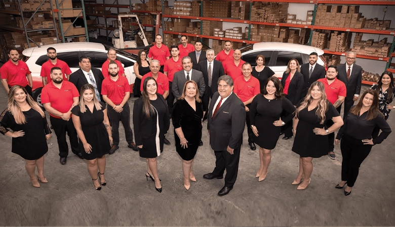 Madelyn and Jose Lopez with the Barlop Business Systems team approximately 10 years ago